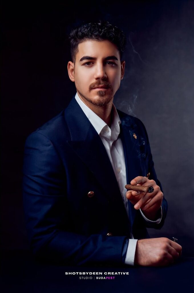 Business portrait of a man in a navy suit by ShotsByDeen