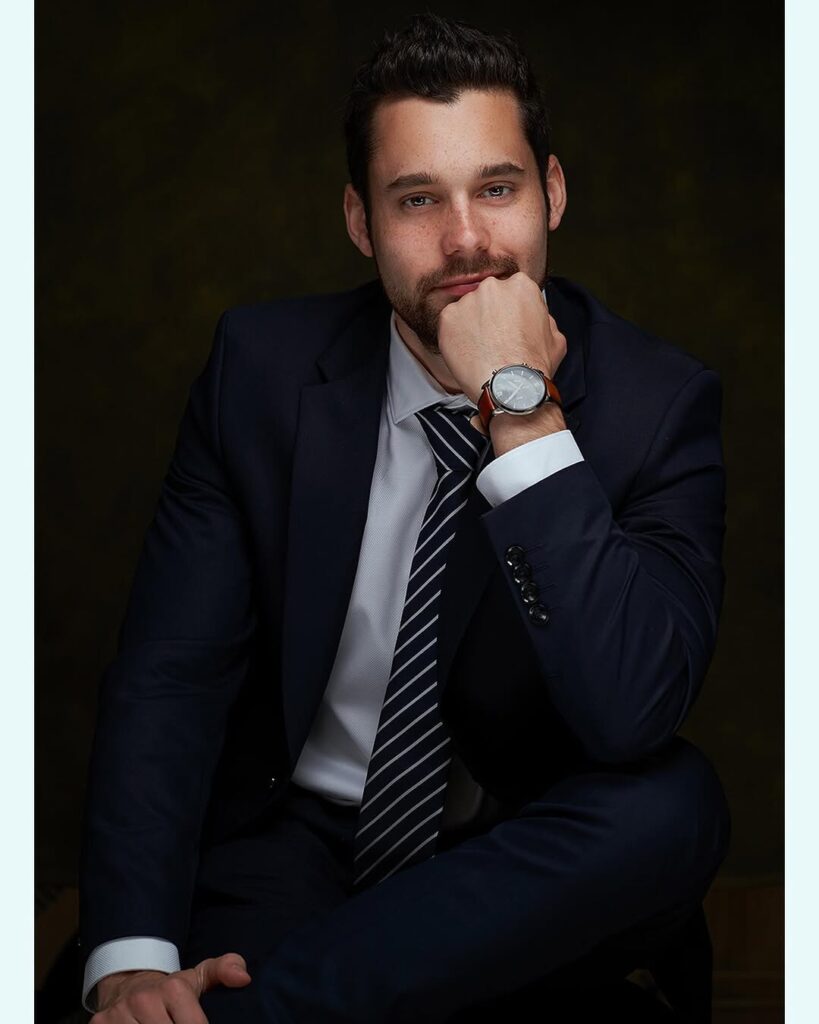 Business portrait of a man in a pinstripe suit by ShotsByDeen