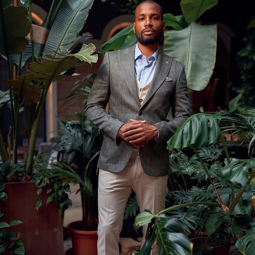 Business portrait of a man among plants by ShotsByDeen